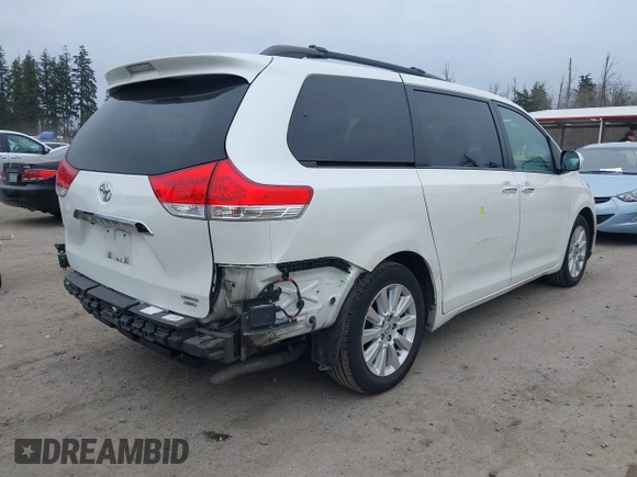 2014 Toyota Sienna Ltd with VIN 5TDDK3DC5ES073175, listed as a IAAI auction lot 41818572 with 107,971 mi miles. Bid and sale history available at carsss.com. Image 4.