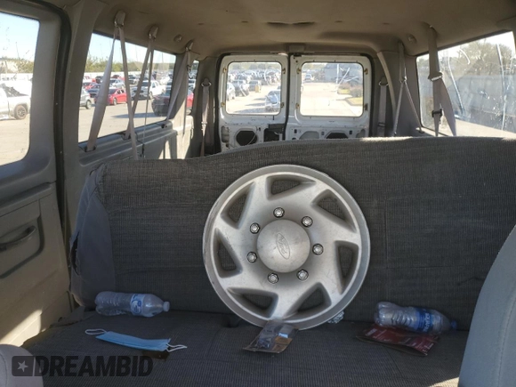 2002 Ford Econoline Passenger XL with VIN 1FBSS31S82HB36096, listed as a Copart auction lot 80654574 with 170,656 mi miles and Salvage title. Bid and sale history available at DreamBid. Image 10.