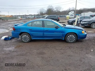 1999 Pontiac Grand Am SE2 with VIN 1G2NE52T2XM904094, listed as a IAAI auction lot 41746997 with 0 mi miles. Bid and sale history available at carsss.com. Image 13.