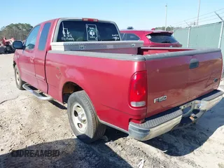 2000 Ford F-150 XL with VIN 1FTZX1725YNA94343, listed as a IAAI auction lot 41659358 with 295,337 mi miles. Bid and sale history available at carsss.com. Image 3.