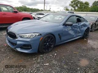 2022 BMW 8 Series M850i z VIN WBAGV8C07NCH87786, wystawiony jako Copart lot #57873465 z przebiegiem 71 419 mil mil oraz Szkoda całkowita • Salvage title. Historia ofert i sprzedaży dostępna na DreamBid. Obrazek 1.