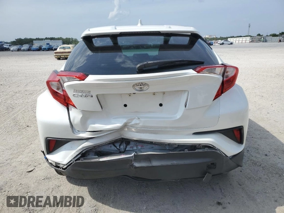 2019 Toyota C-HR XLE z VIN NMTKHMBX5KR079425, wystawiony jako Copart lot #57315345 z przebiegiem 109 441 mil mil oraz Szkoda całkowita • Salvage title. Historia ofert i sprzedaży dostępna na DreamBid. Obrazek 6.