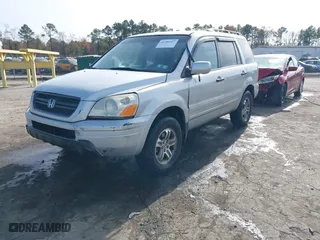 2004 Honda Pilot EX with VIN 2HKYF18634H515163, listed as a IAAI auction lot 40786017 with 206,036 mi miles. Bid and sale history available at carsss.com. Image 17.