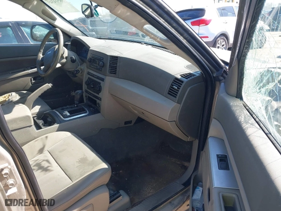 2005 Jeep Grand Cherokee Laredo with VIN 1J4HR48N35C647637, listed as a IAAI auction lot 38514345 with 167,342 mi miles. Bid and sale history available at carsss.com. Image 5.