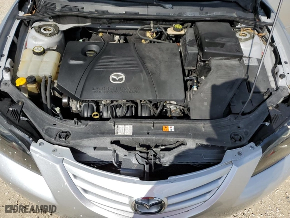 2005 Mazda Mazda3 s with VIN JM1BK323551220599, listed as a Copart auction lot 73826724 with 0 mi miles and Salvage Title. Bid and sale history available at carsss.com. Image 11.