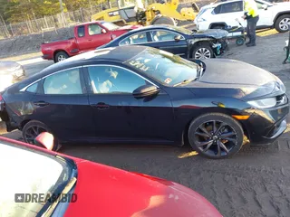 2019 Honda Civic Sport with VIN 2HGFC2F84KH514704, listed as a IAAI auction lot 41225362 with 43,111 mi miles and . Bid and sale history available at DreamBid. Image 13.