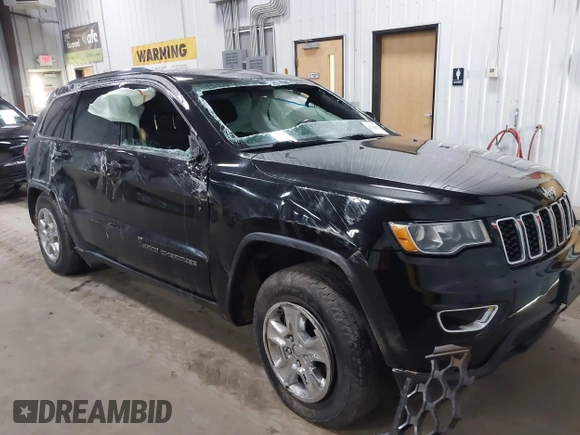 2017 Jeep Grand Cherokee Laredo with VIN 1C4RJFAG2HC625111, listed as a IAAI auction lot 42044571 with 148,533 mi miles and . Bid and sale history available at DreamBid. Image 1.