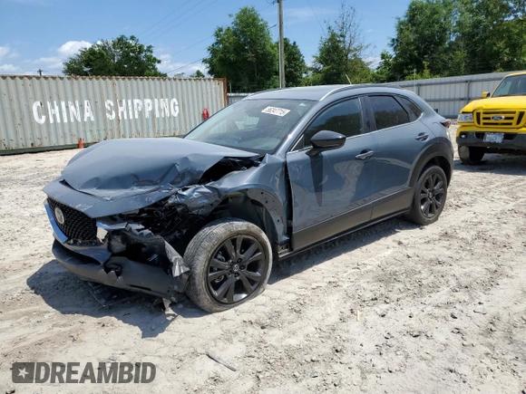 2022 Mazda CX-30 S Carbon Edition с VIN 3MVDMBCL0NM434395, выставлен на аукционе Copart как лот 56247715 с пробегом 40 698 миль миль и На запчасти • Non repairable. История ставок и продаж доступна на DreamBid. Изображение 1.