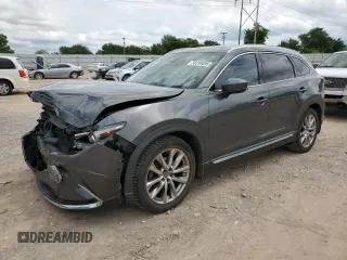 2016 Mazda CX-9 Grand Touring z VIN JM3TCADY3G0125814, wystawiony jako Copart lot #58299595 z przebiegiem 127 035 mil mil oraz Szkoda całkowita • Salvage title. Historia ofert i sprzedaży dostępna na DreamBid. Obrazek 1.