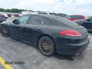 2015 Porsche Panamera S E-Hybrid z VIN WP0AD2A72FL040703, wystawiony jako IAAI lot #41937431 z przebiegiem 77 933 mil mil oraz . Historia ofert i sprzedaży dostępna na DreamBid. Obrazek 3.