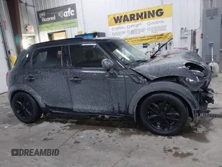 2016 MINI Countryman S z VIN WMWZC5C55GWU00739, wystawiony jako IAAI lot #41333148 z przebiegiem 74 259 mil mil oraz . Historia ofert i sprzedaży dostępna na DreamBid. Obrazek 14.