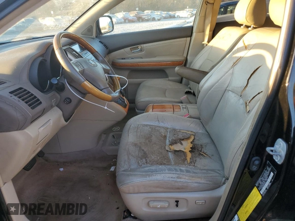2007 Lexus RX 350 z VIN 2T2GK31U07C003715, wystawiony jako Copart lot #77165994 z przebiegiem 206 083 mil mil oraz Czysty tytuł • Clean title. Historia ofert i sprzedaży dostępna na DreamBid. Obrazek 7.