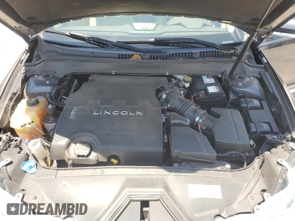 2013 Lincoln MKZ z VIN 3LN6L2GK4DR817557, wystawiony jako Copart lot #60876995 z przebiegiem 77 303 mil mil oraz Szkoda całkowita • Salvage title. Historia ofert i sprzedaży dostępna na DreamBid. Obrazek 11.
