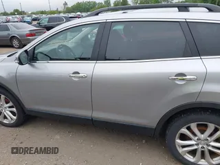 2012 Mazda CX-9 Grand Touring z VIN JM3TB3DA0C0337713, wystawiony jako IAAI lot #42368488 z przebiegiem 184 220 mil mil oraz . Historia ofert i sprzedaży dostępna na DreamBid. Obrazek 14.