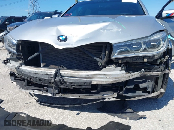 2016 BMW 7 Series 750i xDrive with VIN WBA7F2C52GG417733, listed as a IAAI auction lot 42040625 with 91,007 mi miles. Bid and sale history available at carsss.com. Image 6.