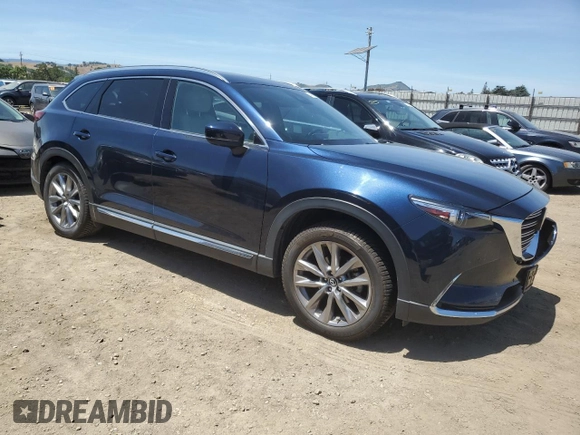 2021 Mazda CX-9 Grand Touring with VIN JM3TCBDY6M0520443, listed as a Copart auction lot 57403735 with 31,414 mi miles and Salvage title. Bid and sale history available at DreamBid. Image 4.