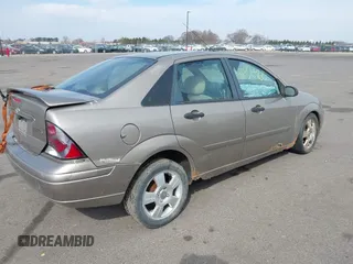 2003 Ford Focus ZTS with VIN 1FAFP38383W323449, listed as a IAAI auction lot 41856460 with Not Provided miles and . Bid and sale history available at carsss.com. Image 4.