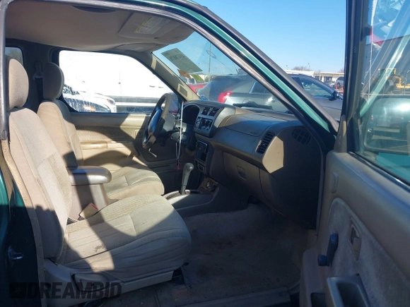 2000 Nissan Frontier XE with VIN 1N6ED26T2YC427520, listed as a IAAI auction lot 41478878 with 215,250 mi miles and . Bid and sale history available at DreamBid. Image 5.