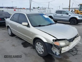 2002 Mazda Protege DX with VIN JM1BJ225121620394, listed as a IAAI auction lot 42043056 with 187,360 mi miles and . Bid and sale history available at DreamBid. Image 1.