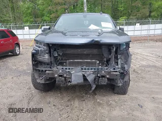 2021 Chevrolet Silverado 1500 LT z VIN 1GCUYDET1MZ294871, wystawiony jako IAAI lot #41968489 z przebiegiem 90 733 mil mil oraz . Historia ofert i sprzedaży dostępna na DreamBid. Obrazek 12.