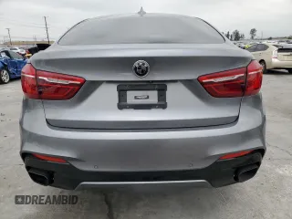 2018 BMW X6 sDrive35i with VIN 5UXKU0C52J0G81057, listed as a Copart auction lot 50698205 with 67,735 mi miles and Salvage Title. Bid and sale history available at carsss.com. Image 6.