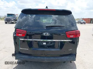 2020 Kia Sedona EX with VIN KNDMB5C19L6617993, listed as a IAAI auction lot 39711859 with 66,083 mi miles. Bid and sale history available at carsss.com. Image 16.