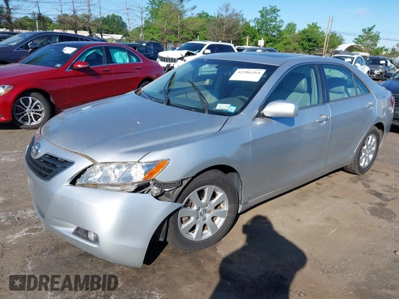 2007 Toyota Camry LE z VIN JTNBK46K473003622, wystawiony jako IAAI lot #42286264 z przebiegiem 105 630 mil mil oraz . Historia ofert i sprzedaży dostępna na DreamBid. Obrazek 2.
