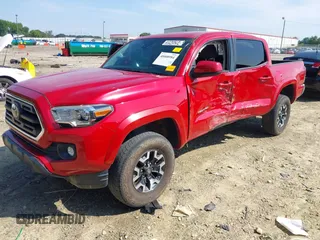 2018 Toyota Tacoma SR with VIN 5TFCZ5AN7JX163344, listed as a IAAI auction lot 40008984 with 93,598 mi miles. Bid and sale history available at carsss.com. Image 6.