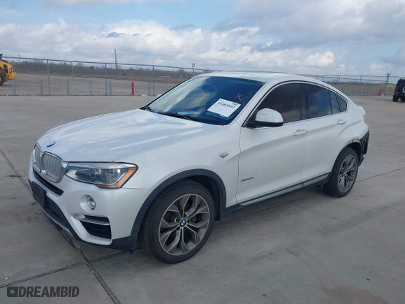 2015 BMW X4 xDrive28i with VIN 5UXXW3C53F0M88714, listed as a IAAI auction lot 41483692 with 132,054 mi miles. Bid and sale history available at carsss.com. Image 2.
