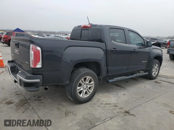 2020 GMC Canyon 2WD SLE with VIN 1GTG5CEN4L1249969, listed as a Copart auction lot 43792235 with 40,017 mi miles and Salvage Title. Bid and sale history available at carsss.com. Image 3.