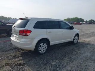 2015 Dodge Journey SE z VIN 3C4PDCAB9FT592689, wystawiony jako IAAI lot #42108322 z przebiegiem 158 140 mil mil oraz . Historia ofert i sprzedaży dostępna na DreamBid. Obrazek 4.