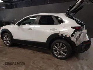 2021 Mazda CX-30 Preferred z VIN 3MVDMBCL2MM210902, wystawiony jako IAAI lot #42522203 z przebiegiem 42 995 mil mil oraz . Historia ofert i sprzedaży dostępna na DreamBid. Obrazek 3.