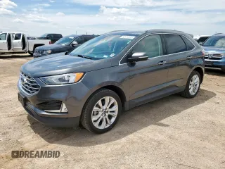 2020 Ford Edge Titanium with VIN 2FMPK3K90LBB37444, listed as a Copart auction lot 60570005 with 118,668 mi miles and Clean title. Bid and sale history available at DreamBid. Image 1.
