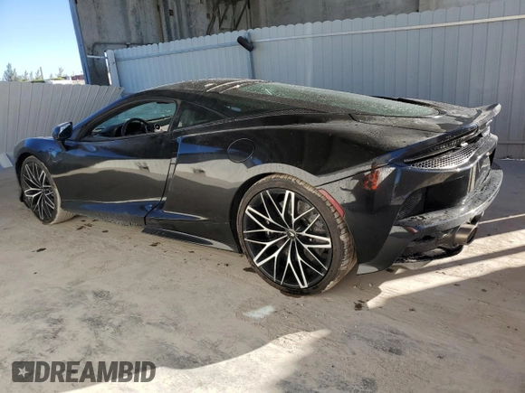 2022 McLaren GT z VIN SBM22GCA4NW001602, wystawiony jako Copart lot #83270334 z przebiegiem 33 668 mil mil oraz Tytuł czysty. Historia ofert i sprzedaży dostępna na DreamBid. Obrazek 2.