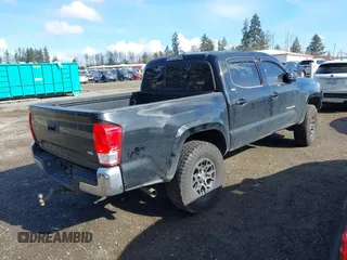 2017 Toyota Tacoma SR5 with VIN 5TFAZ5CN3HX040199, listed as a IAAI auction lot 41734051 with 107,665 mi miles and . Bid and sale history available at carsss.com. Image 4.