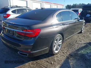 2017 BMW 7 Series ALPINA B7 xDrive with VIN WBA7F2C52HG422187, listed as a IAAI auction lot 41319169 with 114,883 mi miles. Bid and sale history available at carsss.com. Image 4.