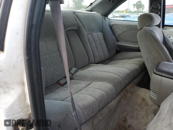 1994 Ford Thunderbird LX with VIN 1FALP62W6RH206764, listed as a Copart auction lot 44213965 with 105,353 mi miles and Salvage Title. Bid and sale history available at DreamBid. Image 10.