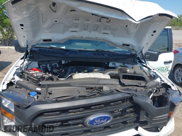 2023 Ford F-150 XL with VIN 1FTMF1CP7PKF84555, listed as a IAAI auction lot 42197597 with 12,216 mi miles and . Bid and sale history available at DreamBid. Image 10.