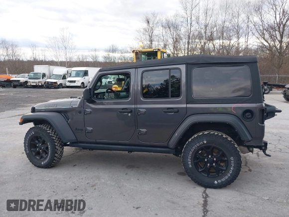 2021 Jeep Wrangler Unlimited Sport S with VIN 1C4HJXDN9MW822281, listed as a IAAI auction lot 41163183 with 23,665 mi miles and . Bid and sale history available at DreamBid. Image 14.