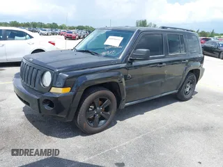 2009 Jeep Patriot Sport with VIN 1J4FT28BX9D140446, listed as a IAAI auction lot 40098694 with 202,342 mi miles and . Bid and sale history available at DreamBid. Image 2.