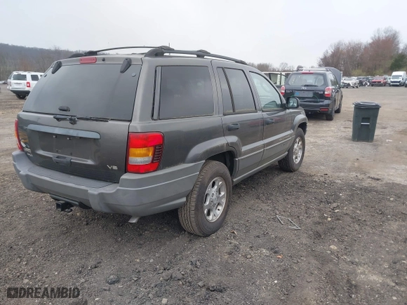 2002 Jeep Grand Cherokee Laredo with VIN 1J4GW48N62C194372, listed as a IAAI auction lot 42007468 with 172,792 mi miles. Bid and sale history available at carsss.com. Image 4.