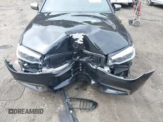 2020 BMW 5 Series M550i xDrive z VIN WBAJS7C09LCD45078, wystawiony jako IAAI lot #41850274 z przebiegiem 75 613 mil mil oraz . Historia ofert i sprzedaży dostępna na DreamBid. Obrazek 6.