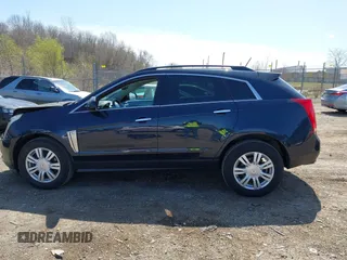 2015 Cadillac SRX with VIN 3GYFNAE39FS571065, listed as a IAAI auction lot 42029749 with 146,098 mi miles and . Bid and sale history available at DreamBid. Image 14.