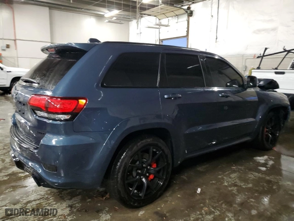 2021 Jeep Grand Cherokee SRT with VIN 1C4RJFDJ2MC606186, listed as a Copart auction lot 79479704 with 39,349 mi miles and Salvage Title. Bid and sale history available at carsss.com. Image 3.