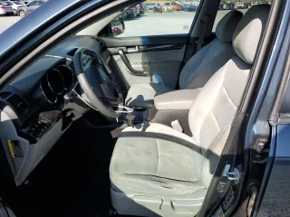 2011 Kia Sorento LX with VIN 5XYKT3A11BG154397, listed as a Copart auction lot 51229365 with 149,922 mi miles and Salvage Title. Bid and sale history available at carsss.com. Image 7.