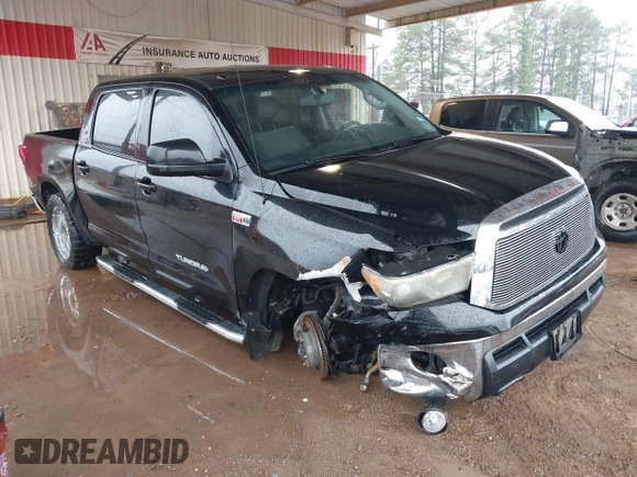 2012 Toyota Tundra 4WD Truck with VIN 5TFDW5F1XCX253223, listed as a IAAI auction lot 41453842 with 163,730 mi miles. Bid and sale history available at carsss.com. Image 1.