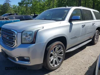 2015 GMC Yukon XL SLT with VIN 1GKS1HKC8FR221608, listed as a IAAI auction lot 42044318 with 215,757 mi miles. Bid and sale history available at carsss.com. Image 17.