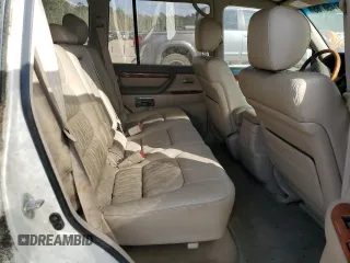 2002 Lexus LX 470 z VIN JTJHT00W623517039, wystawiony jako Copart lot #51458785 z przebiegiem 219 906 mil mil oraz Tytuł czysty. Historia ofert i sprzedaży dostępna na DreamBid. Obrazek 11.