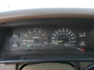 1995 Toyota T100 z VIN JT4VD22F4S0006698, wystawiony jako Copart lot #76022924 z przebiegiem 457 624 mil mil oraz Tytuł czysty. Historia ofert i sprzedaży dostępna na DreamBid. Obrazek 9.