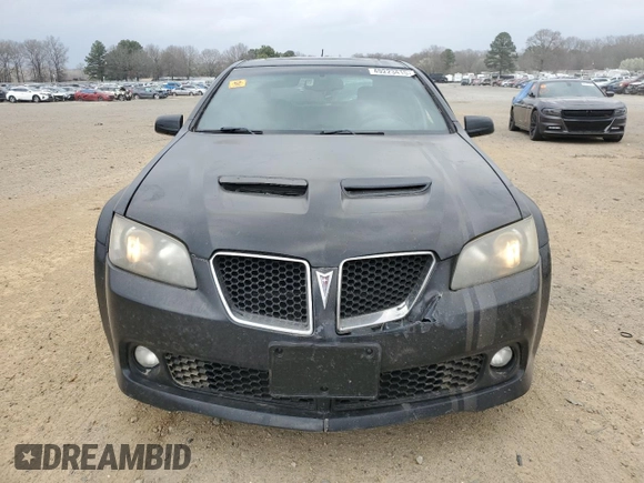 2009 Pontiac G8 z VIN 6G2ER57709L240146, wystawiony jako Copart lot #49223415 z przebiegiem 203 008 mil mil oraz Czysty tytuł • Clean title. Historia ofert i sprzedaży dostępna na DreamBid. Obrazek 5.